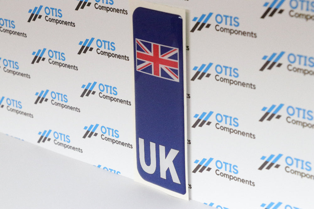 Blue raised gel badge with a Union Jack and white UK lettering